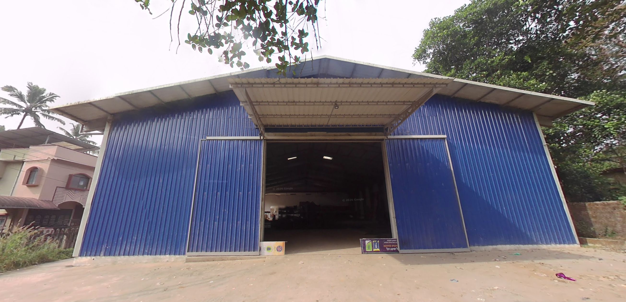 Pai Associates godown with blue sliding doors